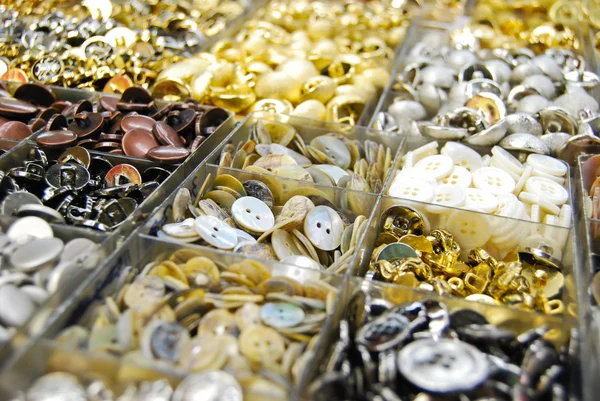 Vintage clothes buttons in market Stock Picture