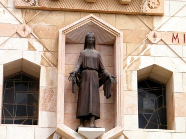 Sculpture of the young Mary in Basilica of the Annunciation in Nazareth, Israel clipart