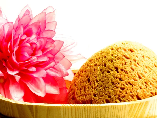 Sponge for bath with lotos flower — Stock Photo, Image