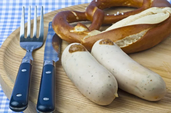 Veal sausage with pretzel — Stock Photo, Image