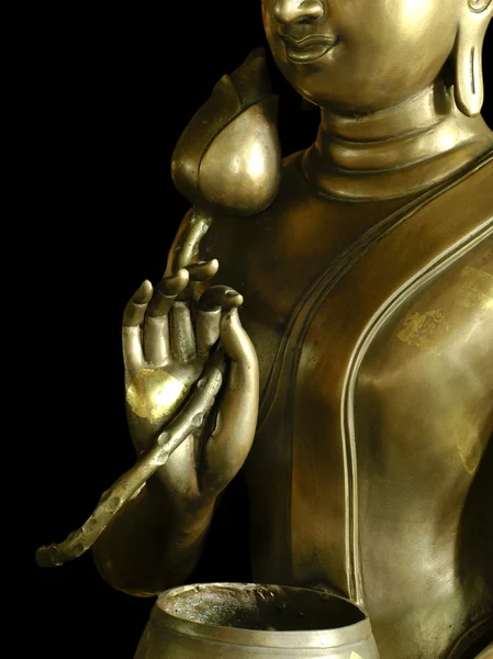 Lotus mosaz v rukou Buddhy. — Stock fotografie