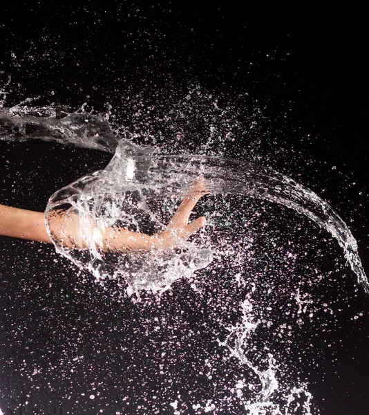 stock image Hand girl resists flow, water jet