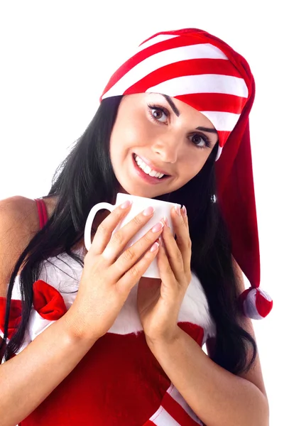 Santa girl holding a cup, drink. Holidays Christmas And New Year. — Stock Photo, Image