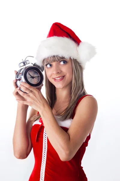 Santa dívka držící, hodiny, Budík a přemýšlel. vánoční svátky — Stock fotografie