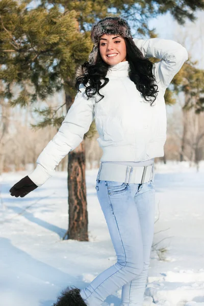 Stock image A young beautiful girl on a walk in a winter park, winter, snow,