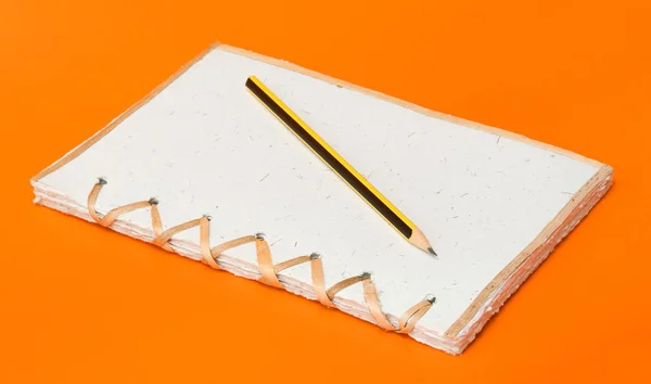 Recycled notepad and pencil — Stock Photo, Image