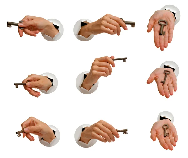 Hände mit Schlüsseln lizenzfreie Stockbilder