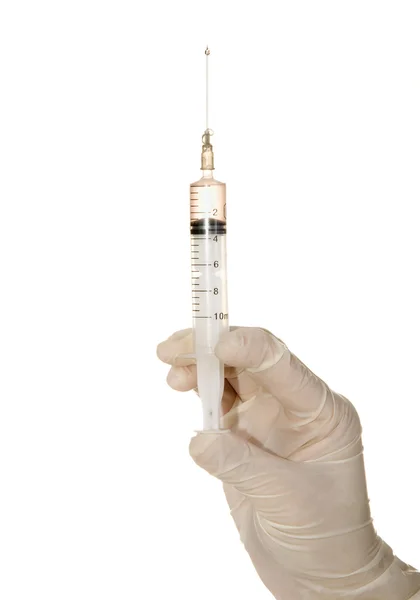 Syringe in his hand — Stock Photo, Image
