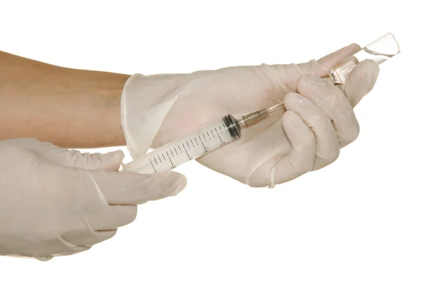 Syringe in his hand — Stock Photo, Image