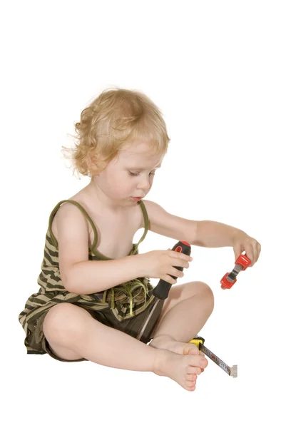 Girl with a screwdriver pliers and a tape — Stock Photo, Image