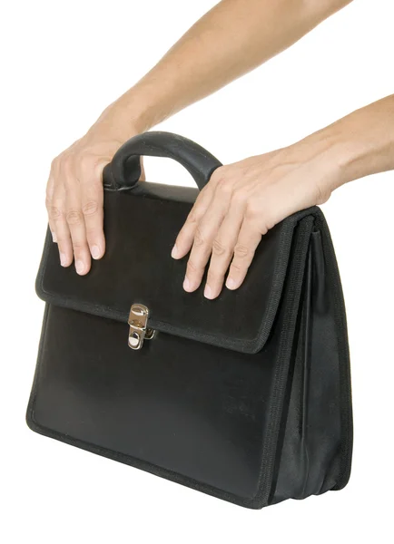 Hand holding a black briefcase — Stock Photo, Image