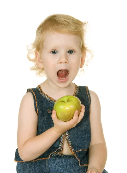 Small girl with apple Stock Picture