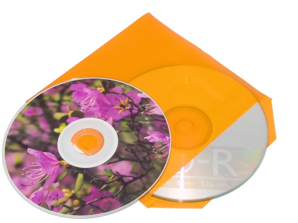 Kompakt diskler ve zarf — Stok fotoğraf