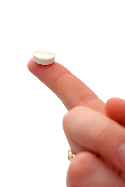 Pill on finger — Stock Photo, Image