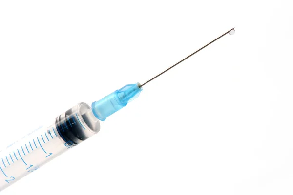 Syringe and drop — Stock Photo, Image