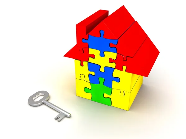 Puzzle Haus und Schlüssel — Stockfoto