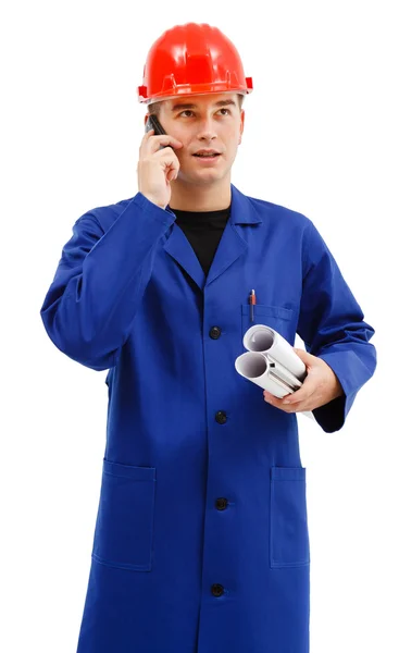 Young engineer with projects and telephone — Stock Photo, Image