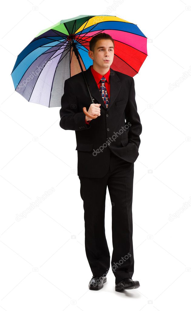 Casual man walking with colorful umbrella — Stock Photo © icefront 4140846
