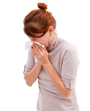 Young woman blowing her nose clipart