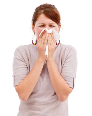 Young woman blowing her nose clipart