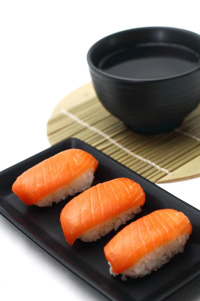 Lax sushi med soppa Royaltyfria Stockbilder