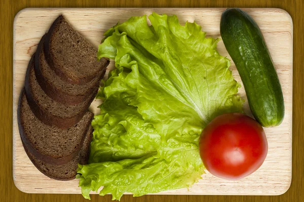 Brød og grøntsager - Stock-foto