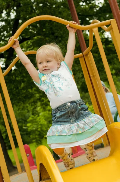 stock image Young blond girl in the city park