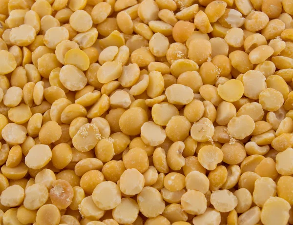 黄色のエンドウ豆の背景 — ストック写真