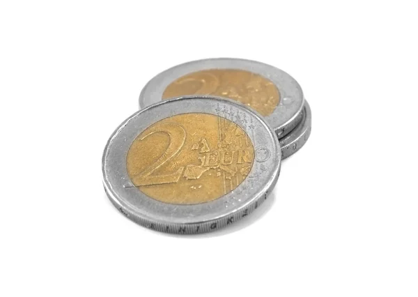 独立于白色背景的欧元硬币 — 图库照片
