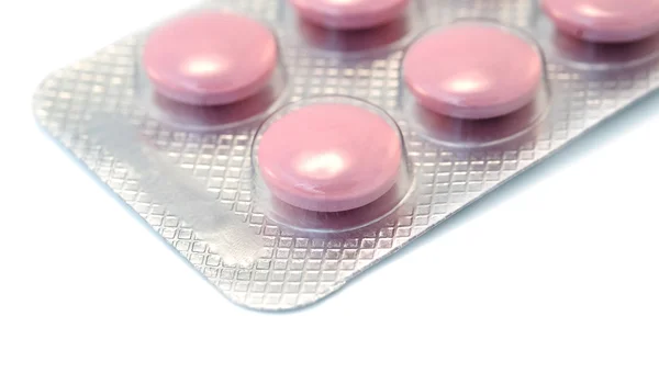 Las Píldoras Rosadas Están Aisladas Sobre Fondo Blanco — Foto de Stock