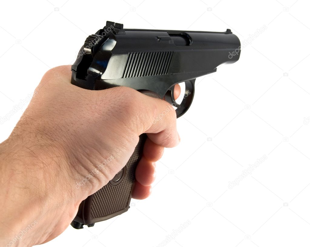 Aiming gun in a hand — Stock Photo © PetroP #4974126