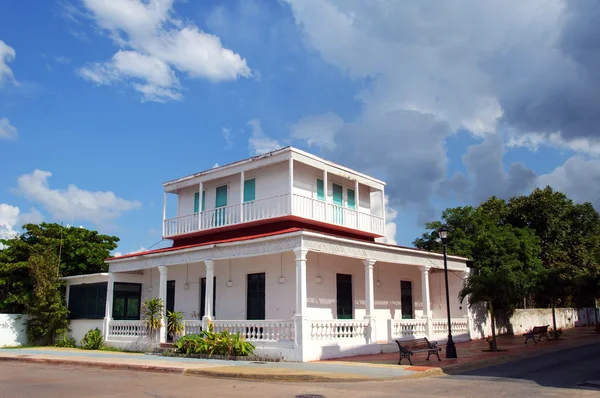 stock image Capture of a white wooden house blue sky