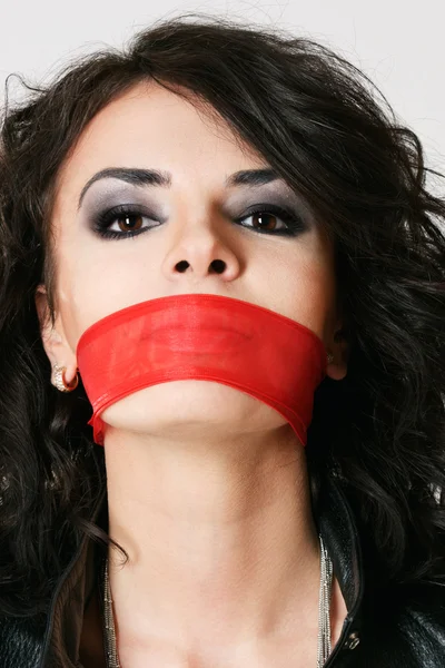 Mujer con la boca atada — Foto de Stock