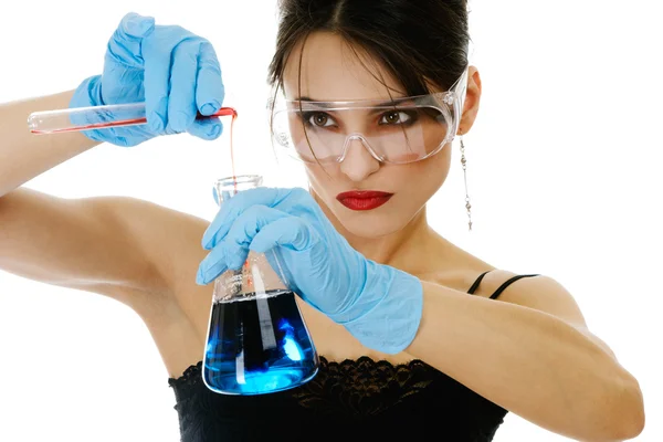 Beautiful woman with chemical glassware — Stock Photo, Image