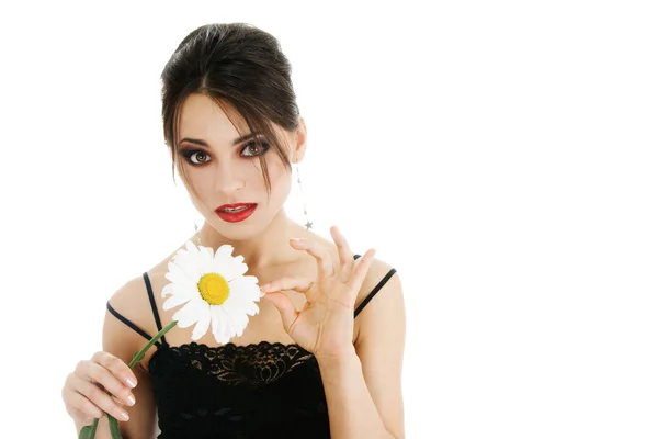 Krásná žena s sedmikráska květ — Stock fotografie