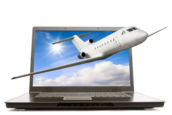 Modern notebook computer with airliner flying out — Stock Photo, Image