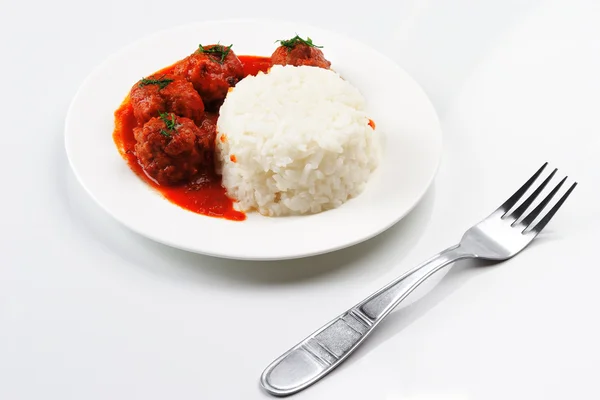 stock image Noisettes with rice garnish