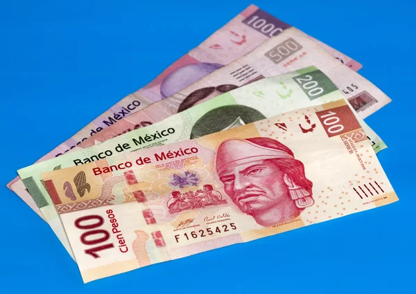 Мексиканське песо рахунки шпалерами синього кольору — стокове фото