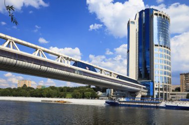 Pedestrian bridge Bagration over Moscow river and the International Business Centre, Moscow, Russia clipart