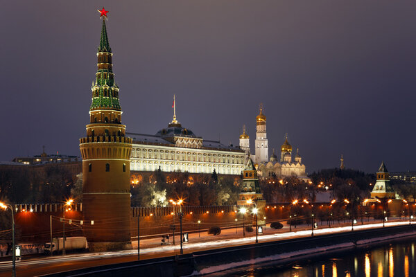 Moscow Kremlin and Moscow river, view from the bridge in the evening. Russia.