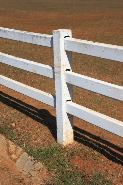 stock image White pole fence in farm.