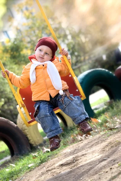 Stock image The girl in the orange jacket