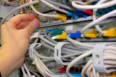 Technician checks network connections clipart