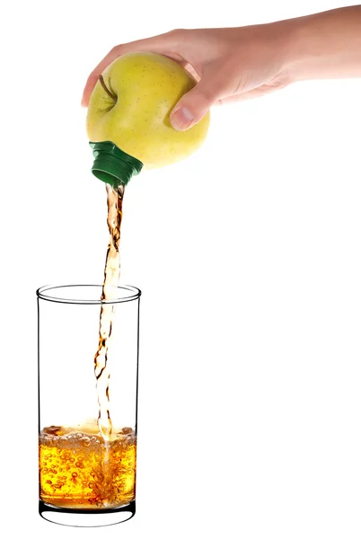 Pouring apple juice into a glass of apple — Stock Photo, Image