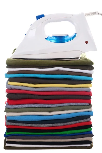 Colored shirts and electric iron — Zdjęcie stockowe