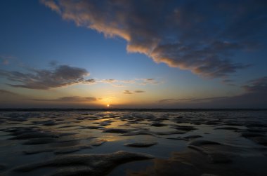 Romo island sunset with sand ripples, Denmark clipart