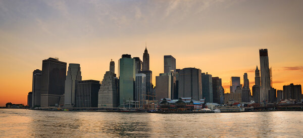 New York City Manhattan skyline sunset panorama with office skyscrapers building over Hudson River
