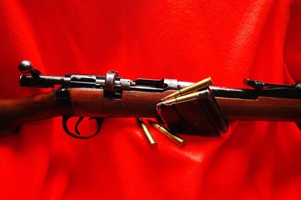 stock image A bolt action hunting rifle with ammo