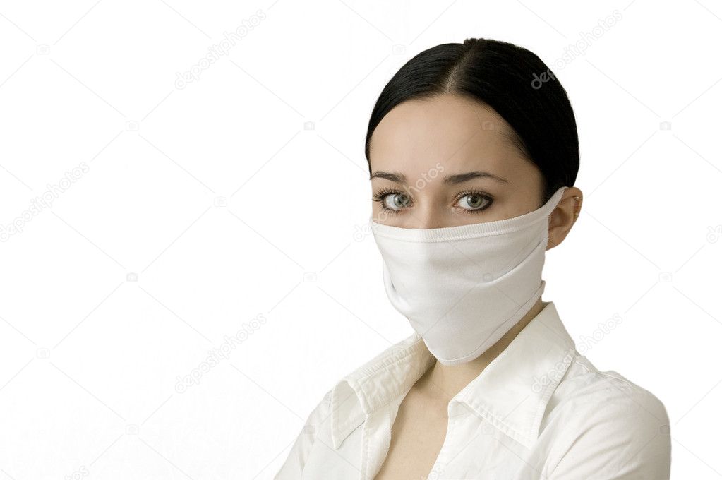 The beautiful women in a medical mask