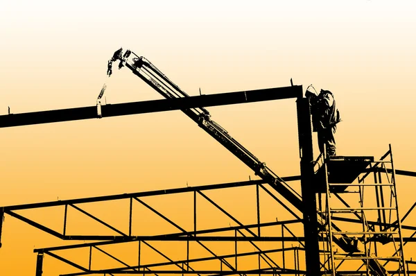 Assembling iron construction-silhouette worker — Stock Photo, Image